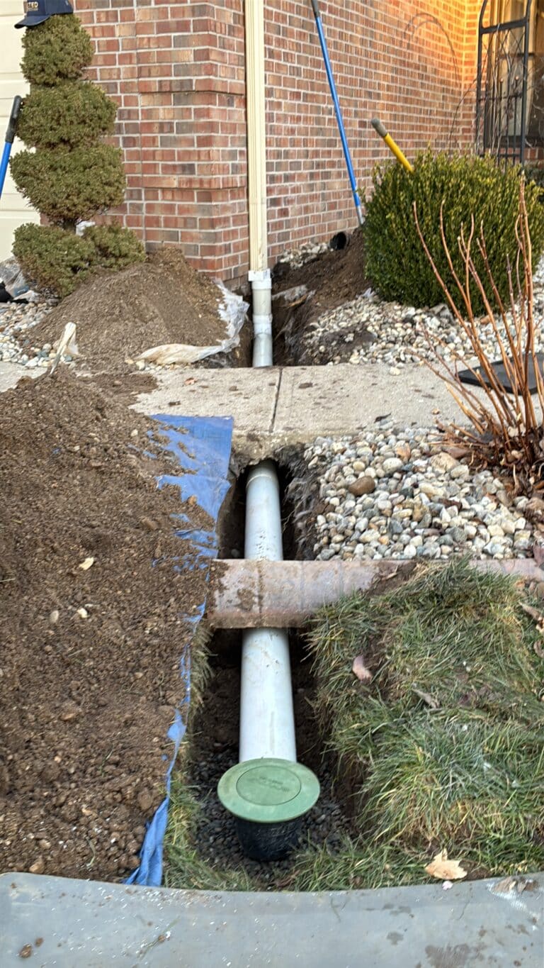During photo – Shannon Majors – Downspout Extension Job in Greenwood