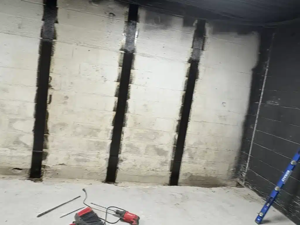 Carbon strips applied to a basement wall in Indiana